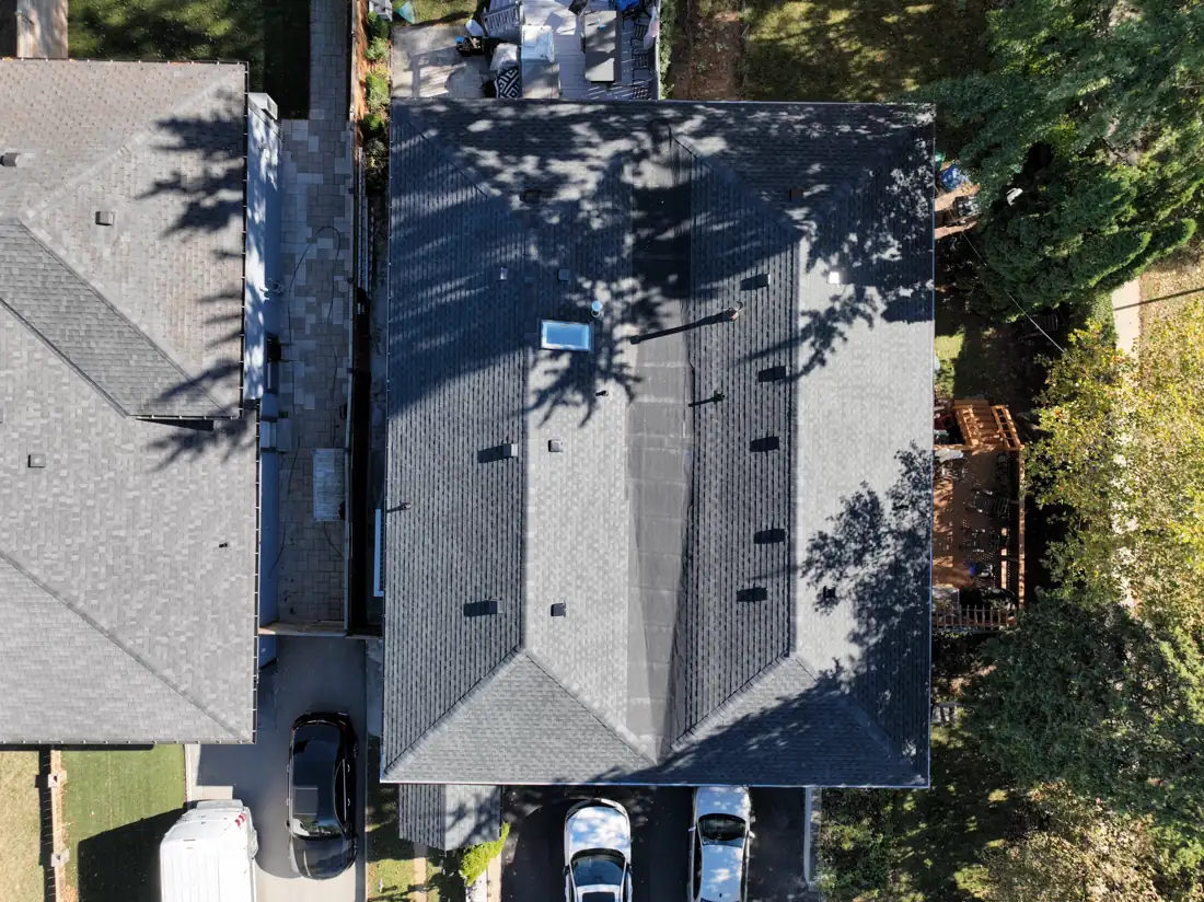 Directly overhead drone view of the completed roof on a Mississauga detached house on Bonnymede Drive